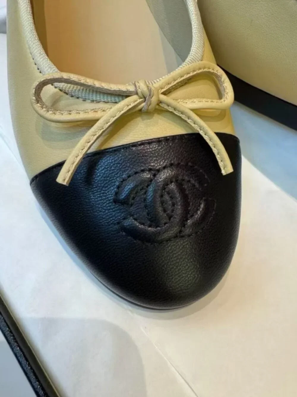 CHANEL Two-Tone Leather Embossed CC Bow Round Toe Ballet Flats